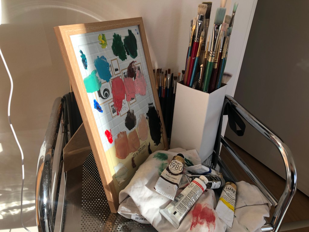 Use a glass picture frame as paint mixing pallet, oil paint brushes should not be used to mix paint.